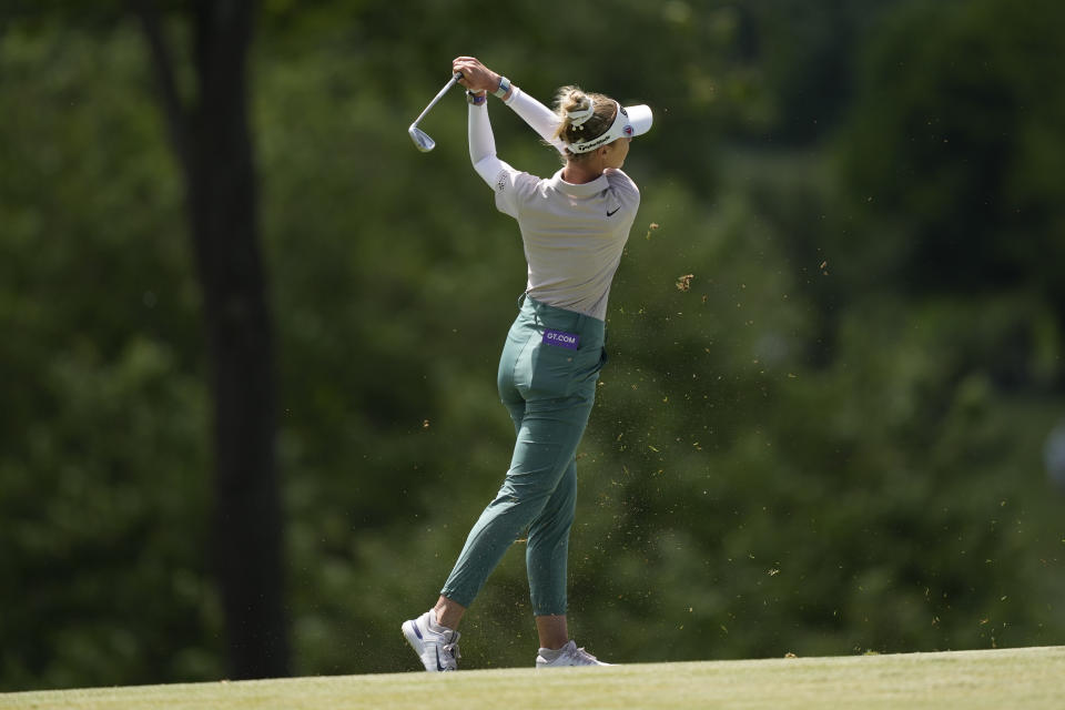 Nelly Korda hits her approach shot to the second hole during the first round of the U.S. Women's Open golf tournament at Lancaster Country Club, Thursday, May 30, 2024, in Lancaster, Pa. (AP Photo/Matt Rourke)