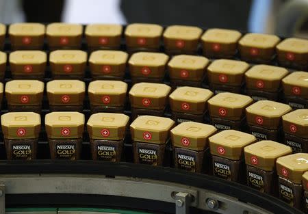 Jars of Nescafe coffee are pictured in a production facility in Orbe in this March 25, 2013 file photo. REUTERS/Denis Balibouse/Files