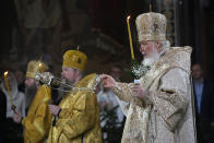 Russian Orthodox Patriarch Kirill delivers a Christmas service in the Christ the Saviour Cathedral in Moscow, Russia, Friday, Jan. 6, 2023. Orthodox Christians celebrate Christmas on Jan. 7, in accordance with the Julian calendar. (AP Photo/Alexander Zemlianichenko, Pool)