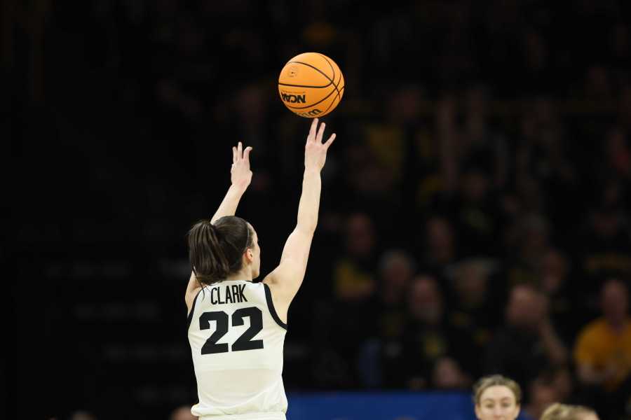 IOWA CITY, IOWA – MARCH 25: Caitlin Clark #22 of the Iowa Hawkeyes shoots a three-point field goal against the West Virginia Mountaneers during the second round of the 2024 NCAA Women’s Basketball Tournament held at Carver-Hawkeye Arena on March 25, 2024 in Iowa City, Iowa. (Photo by Rebecca Gratz/NCAA Photos via Getty Images)