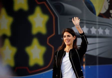 Rome's mayor Virginia Raggi waves during the 5-Star movement gathering in Rimini, Italy, September 23, 2017. REUTERS/Max Rossi