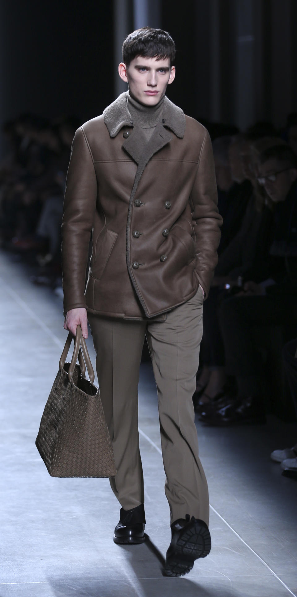 A model wears a creation for Bottega Veneta men's Fall-Winter 2013-14 collection, part of the Milan Fashion Week, unveiled in Milan, Italy, Sunday, Jan. 13, 2013. (AP Photo/Luca Bruno)