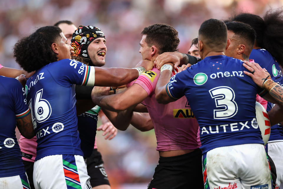 Seen here, players from the Warriors and Panthers clashing during the round 10 clash for the NRL's Magic Round.