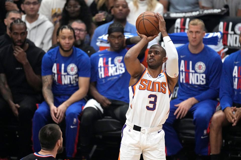 Phoenix Suns guard Chris Paul shoots during the first half in Game 4 of a first-round NBA basketball playoff series against the Los Angeles Clippers Saturday, April 22, 2023, in Los Angeles. (AP Photo/Mark J. Terrill)