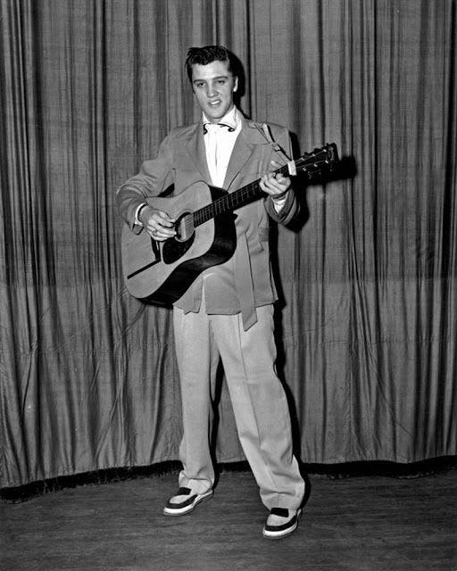 Elvis and his Martin guitar, 1955, Ellis Auditorium in Memphis.