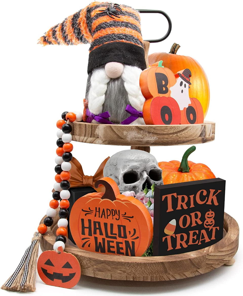 <p><a href="https://clicks.trx-hub.com/xid/hearstcorp_9eb67_clg?q=https%3A%2F%2Fwww.walmart.com%2Fip%2FNXN-HOME-Halloween-Tiered-Tray-Decorations-Including-Trick-or-Treat-Wooden-Signs-Cute-Gnomes-Plush-and-Bead-Garland%2F1968248198&p=https%3A%2F%2Fwww.countryliving.com%2Fhome-design%2Fdecorating-ideas%2Fg44518674%2Fbest-walmart-halloween-decorations%2F&utmSource=yahoo-us&utmCampaign=55&utmMedium=syn" rel="nofollow noopener" target="_blank" data-ylk="slk:Shop Now;elm:context_link;itc:0;sec:content-canvas" class="link ">Shop Now</a></p><p>Halloween Tiered Tray </p><p>walmart.com</p><p>$19.90</p>