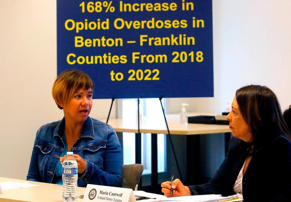 Melissa Cross, community health nurse at Blue Mountain Heart to Heart, shares her personal story with Sen. Maria Cantwell during a roundtable discussion on the fentanyl crisis.