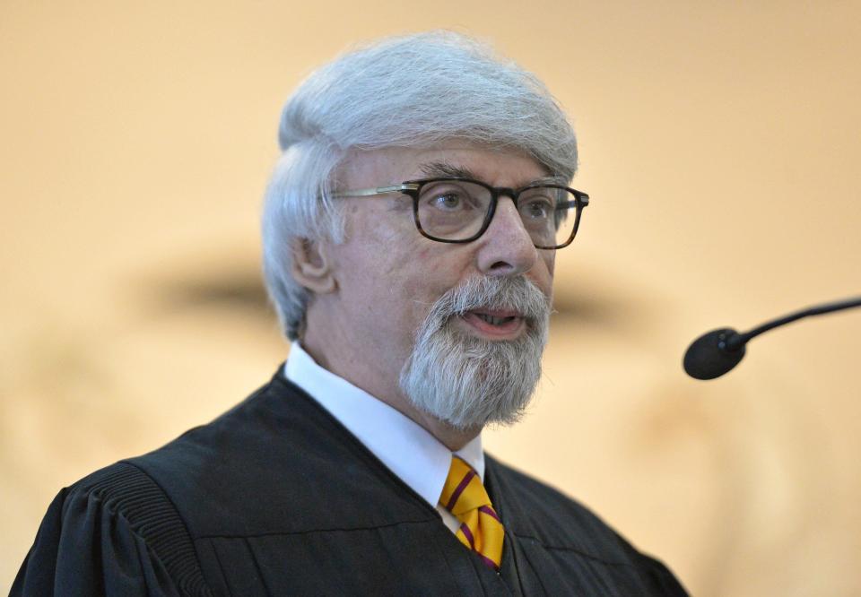 Retired Erie County Judge Shad Connelly hired Elizabeth Hirz as a law clerk before she joined the Erie County District Attorney's Office 19 years ago, and Connelly's daughter Erin Connelly Marucci, now an Erie County judge, worked as an assistant district attorney with Hirz and under District Attorney Jack Daneri. Connelly is shown here in January 2020 as he introduces his daughter at her swearing-in ceremony as a judge.