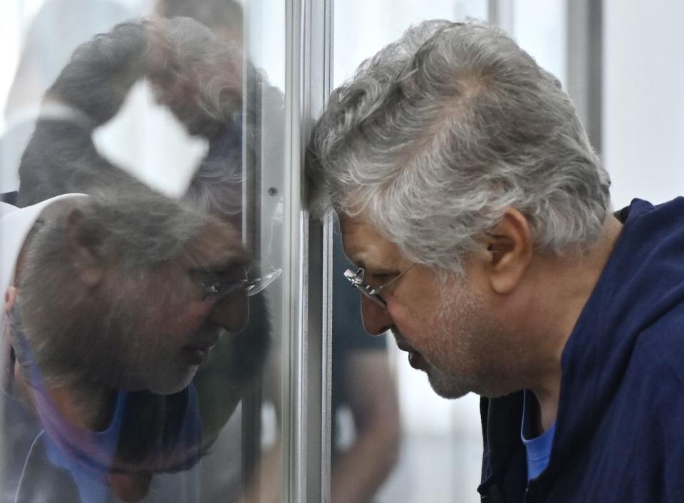 Ukrainian billionaire businessman Ihor Kolomoisky speaks with his lawyer during his appeal hearing in Kyiv Court of Appeal on Sept. 25, 2023Kolomoisky was accused by Ukraine's anti-corruption watchdog of embezzling funds from a bank he co-founded. (Genya Savilov/AFP via Getty Images)