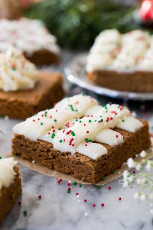 <p>Sugar Spun Run</p><p>Soft and chewy gingerbread cookie bars are decorated with a simple frosting and sprinkles! Flavored with all my favorite holiday spices, this is a fun festive treat for the season.</p><p><strong>Get the recipe: <a href="https://sugarspunrun.com/gingerbread-cookie-bars/" rel="nofollow noopener" target="_blank" data-ylk="slk:Festive Gingerbread Cookie Bars;elm:context_link;itc:0;sec:content-canvas" class="link ">Festive Gingerbread Cookie Bars </a></strong></p>