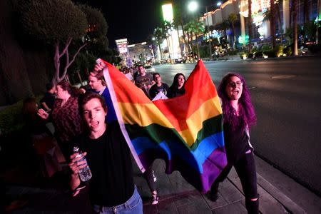 Pino Alessi (L) and Monica Davila lead a protest march against the election of Republican Donald Trump as President of the United States, along the Las Vegas Strip in Las Vegas, Nevada, U.S. November 9, 2016. REUTERS/David Becker