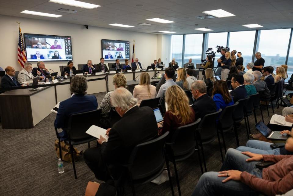 Members of the public and media listen during the Texas Medical Board Full Board Meeting in the George H.W. Bush Building in Austin, Texas on Mar. 22, 2024. All the seats in the room were filled as everyone listened while they talked about agenda item number 28, ‘Consideration and possible action on rules regarding exceptions to the ban on abortions.’