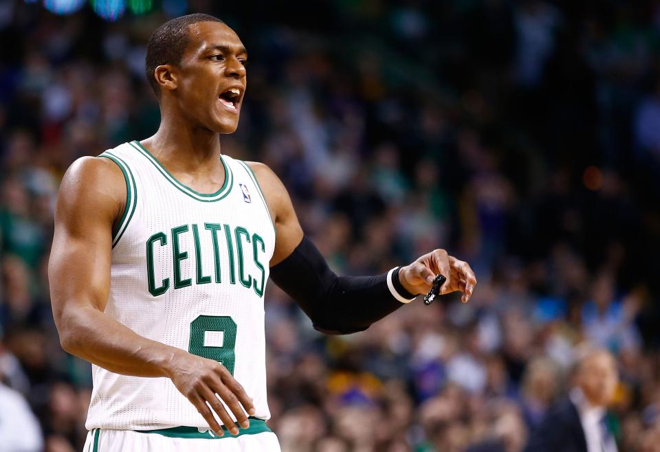 BOSTON, MA - JANUARY 17:  Rajon Rondo #9 of the Boston Celtics yells to his teammates in the fourth quarter against the Los Angeles Lakers during the game at TD Garden on January 17, 2014 in Boston, Massachusetts. NOTE TO USER: User expressly acknowledges and agrees that, by downloading and or using this photograph, User is consenting to the terms and conditions of the Getty Images License Agreement.  (Photo by Jared Wickerham/Getty Images)