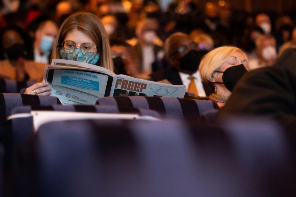 People sit in their seats during the opening night of Freep Film Festival with the film Gradually, Then Suddenly:The Story of the Detroit Bankruptcy at the Detroit Institute of Arts in Detroit on Wednesday, April 27, 2022.