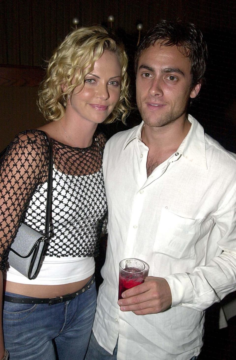 TBT: Charlize Theron and Stuart Townsend