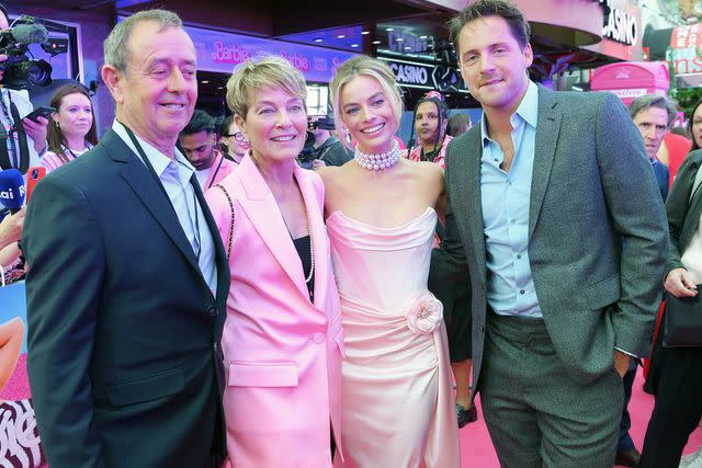 &lt;p&gt;Antony Jones/Getty&lt;/p&gt; Margot Robbie with dad Doug Robbie, mom Sarie Kessler and husband Tom Ackerley on July 12, 2023.