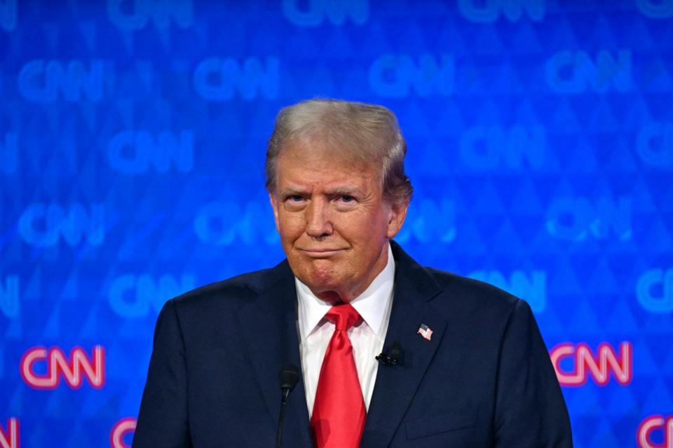 PHOTO: Former President Donald Trump gestures as he participates in the first presidential debate of the 2024 elections with President Joe Biden at CNN's studios in Atlanta, GA, June 27, 2024.  (Andrew Caballero-Reynolds/AFP via Getty Images)