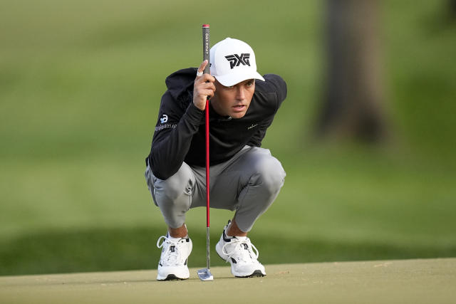 Eric Cole lines up a putt on the fourth hole during the first round of the PGA Championship golf tournament at Oak Hill Country Club on Thursday, May 18, 2023, in Pittsford, N.Y. (AP Photo/Eric Gay)