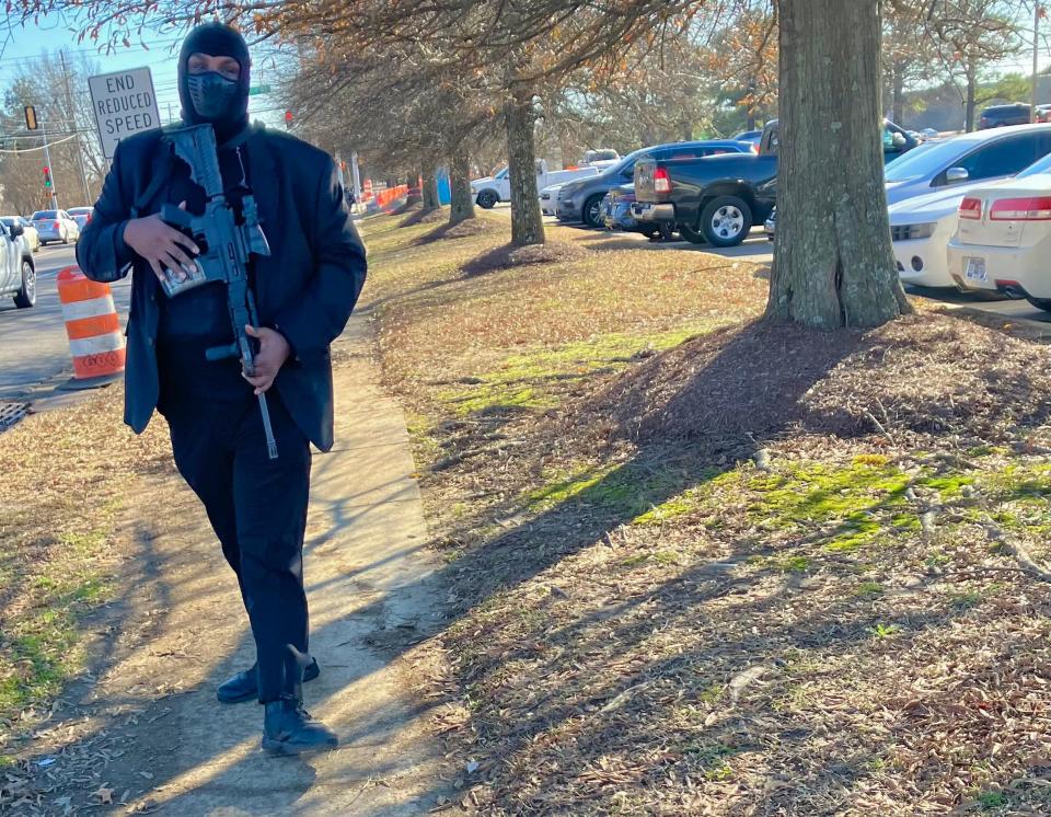 Heavily armed private security patrolled the area surrounding the New Direction Christian Church in Hickory Hill on Wednesday during the funeral of Anthony "Big Jook" Mims.