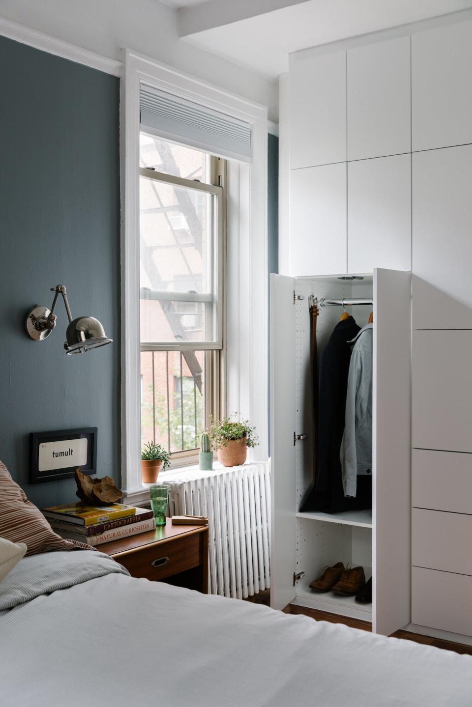 Closet with sleek white doors