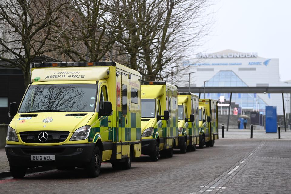 A general view shows ambulances outside the ExCeL London, the site of the London Nightingale Hospital, in London on January 10, 2021 and one of the seven mass Covid-19 vaccination hubs opening around the country from next week. - Every adult in Britain will have been offered a coronavirus vaccination by the autumn, Health Secretary Matt Hancock said on January 10, in the UK's biggest ever inoculation campaign. ExCeL London will host one of seven mass vaccination hubs opening around the country from next week. (Photo by DANIEL LEAL-OLIVAS / AFP) (Photo by DANIEL LEAL-OLIVAS/AFP via Getty Images)