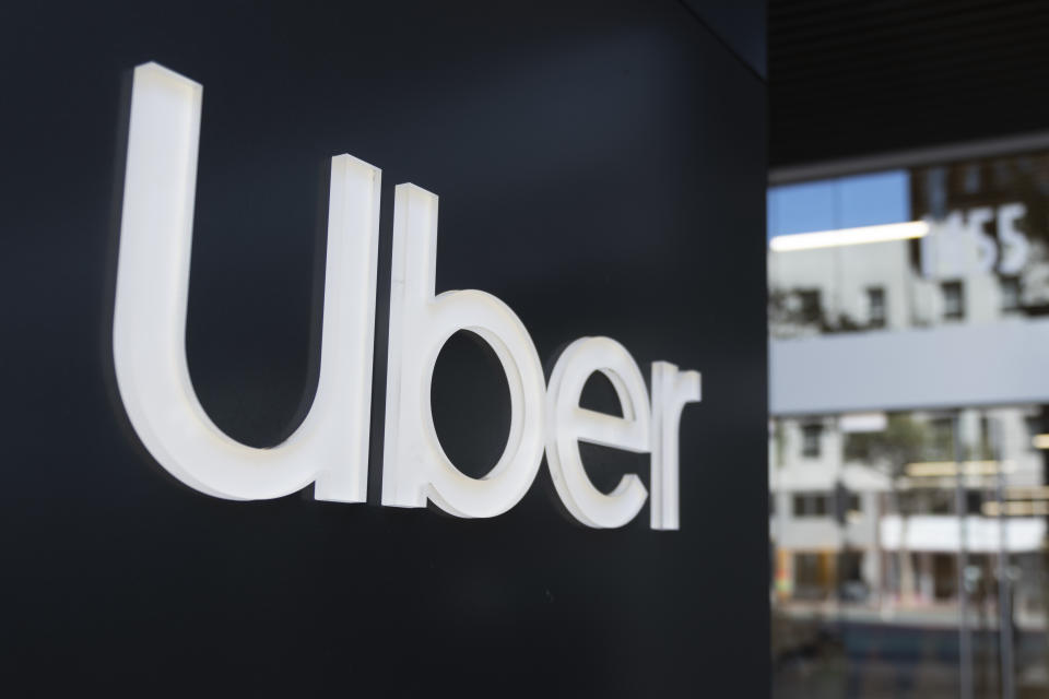 Uber logo is seen at its headquarters in San Francisco, California on October 15, 2019. The ridesharing company has laid off 350 employees on Monday, October 14, in an effort to cut cost. Shares of Uber climbed 3.2% following the announcement. (Photo by Yichuan Cao/NurPhoto via Getty Images)