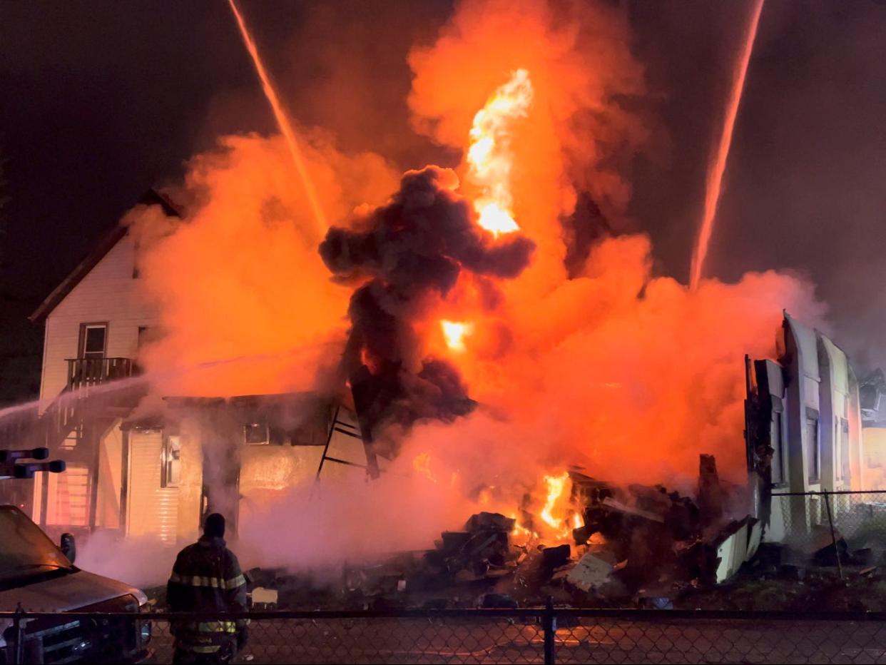 Firefighters extinguish a fire that broke out at Evergreen Nursing Home in Spring Valley, New York (BENNY POLATSECK via REUTERS)