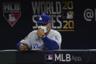 Los Angeles Dodgers manager Dave Roberts watches during the sixth inning in Game 5 of the baseball World Series against the Tampa Bay Rays Sunday, Oct. 25, 2020, in Arlington, Texas. (AP Photo/Tony Gutierrez)