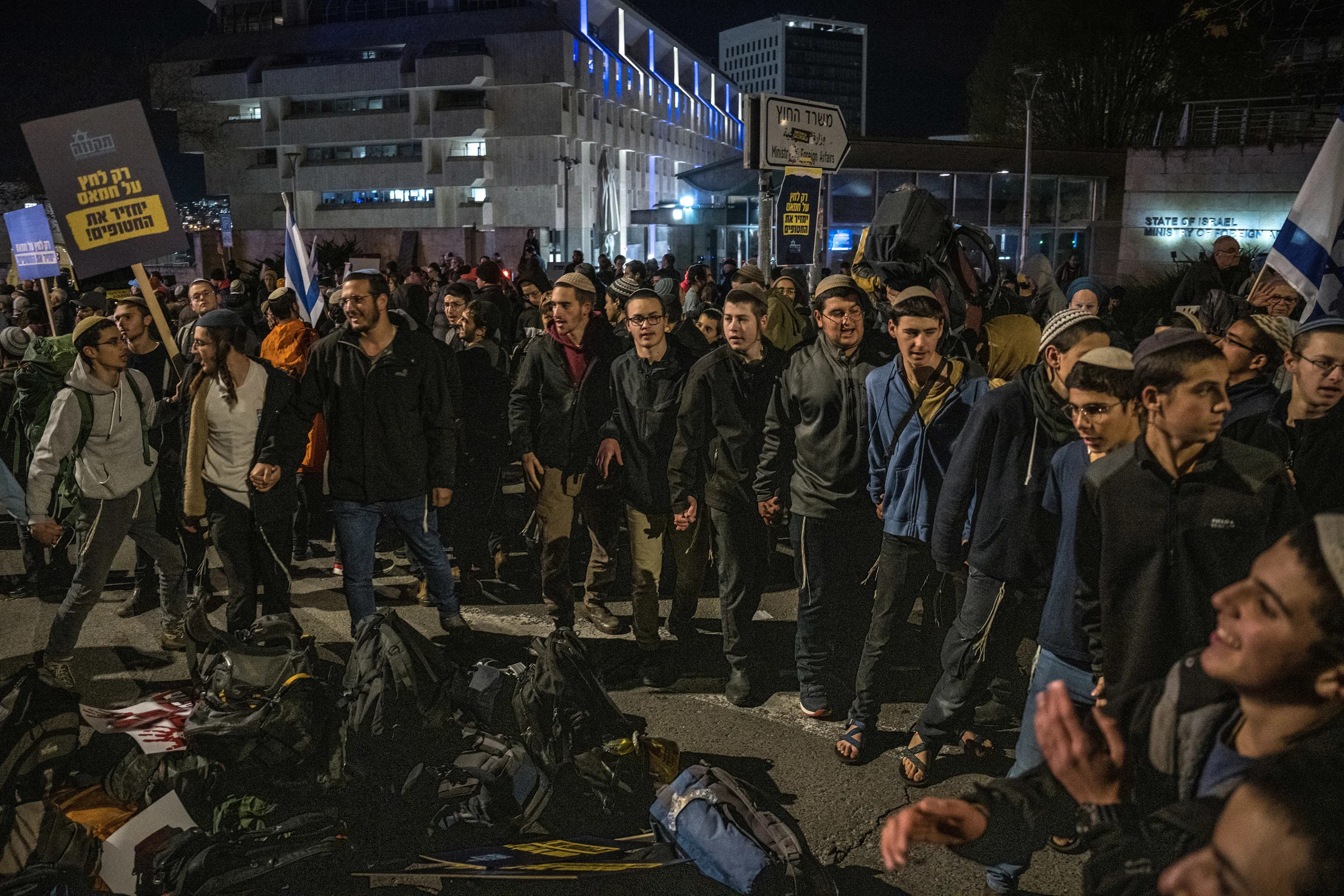 Far-right Israelis gather in front of the Israeli Parliament to protest a possible cease-fire with Hamas, in Jerusalem, Feb. 8, 2024. (Sergey Ponomarev/The New York Times)