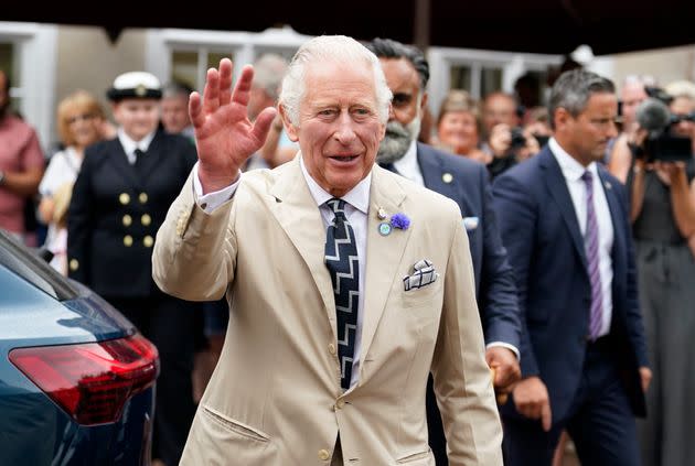 The Prince of Wales waves to members of the public during a visit to Cockington Court on July 20 in Torquay, United Kingdom. (Photo: WPA Pool via Getty Images)