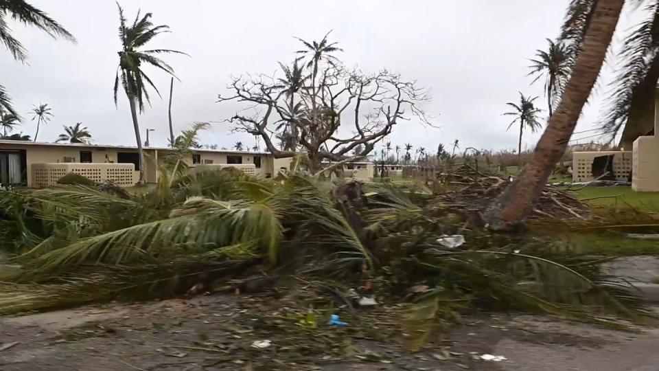 Debris litters base housing on Andersen Air Force Base, Guam, May 26. (Screen grab from video by Staff Sgt. Divine Cox/Air Force)