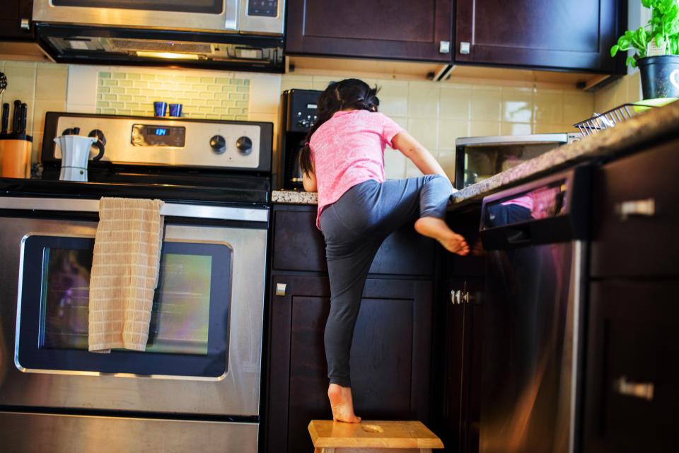 If you've got unsteady kids climbing up on countertops, make sure you have tools at the ready that won't hurt them. (Photo: Getty Images)