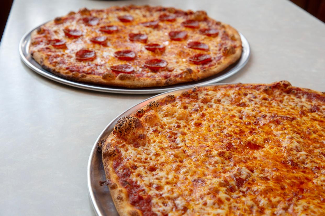 Detail of a plain pizza and a pepperoni pizza at Vic's Italian Restaurant in Bradley Beach Wednesday, July 5, 2023.