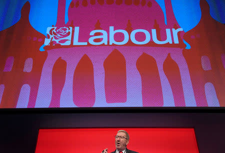 General Secretary of Unite the Union, Len McLuskey speaks on stage at the Labour Party Conference venue in Brighton, Britain, September 25, 2017. REUTERS/Toby Melville