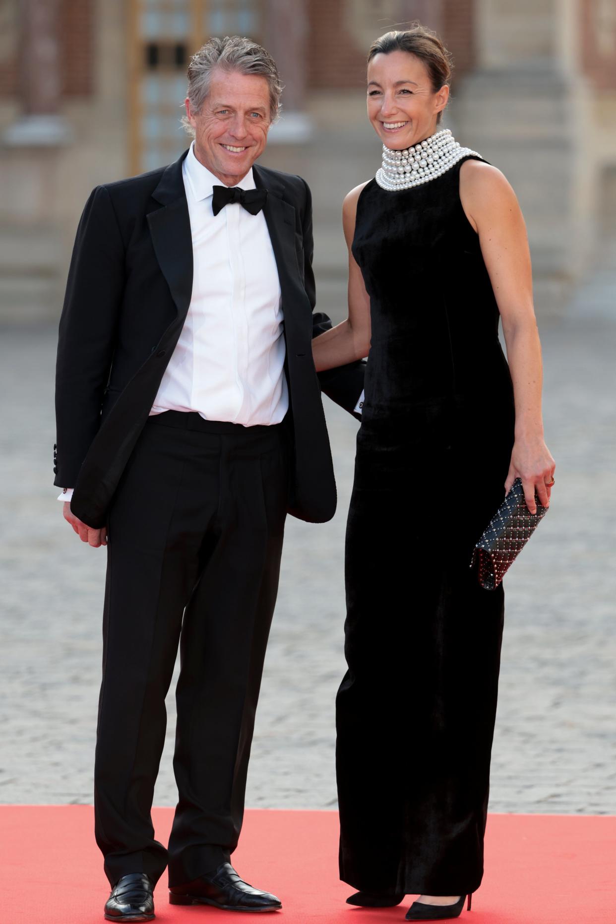 Hugh Grant and Anna Elisabet Eberstein arrive ahead of  the lavish state dinner (Getty Images)