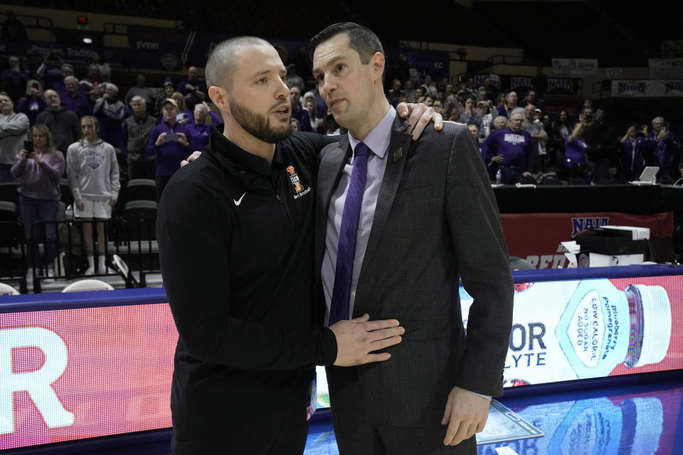 Indiana Tech head coach Ted Albert, left, and College of Idaho head coach Colby Blaine talk after their NAIA men's national championship college basketball game Saturday, March 18, 2023, in Kansas City, Mo. College of Idaho won 73-71. (AP Photo/Charlie Riedel)