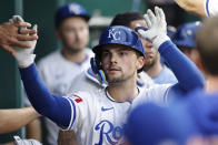 Kansas City Royals' Michael Massey celebrates in the dugout after hitting a home run during the seventh inning of a baseball game against the Milwaukee Brewers in Kansas City, Mo., Monday, May 6, 2024. (AP Photo/Colin E. Braley)