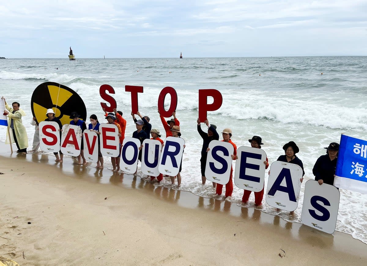 Protests in Busan, South Korea, against Japan releasing treated radioactive water from the wrecked Fukushima nuclear power plant (Reuters)