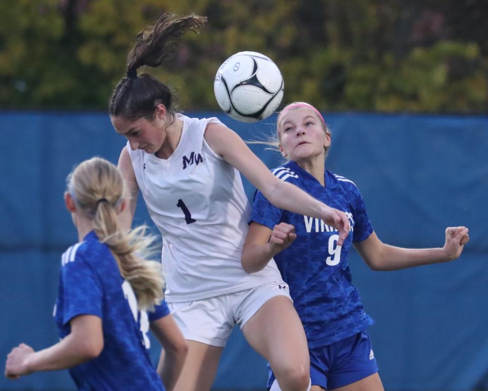 Monroe-Woodbury's Natalie Harwood (1) fights for the ball with Valley Central's Hannah Stahl during the Section 9 Class AA girls soccer championship at Middletown Oct. 26, 2022. Monroe-Woodbury won 2-0.