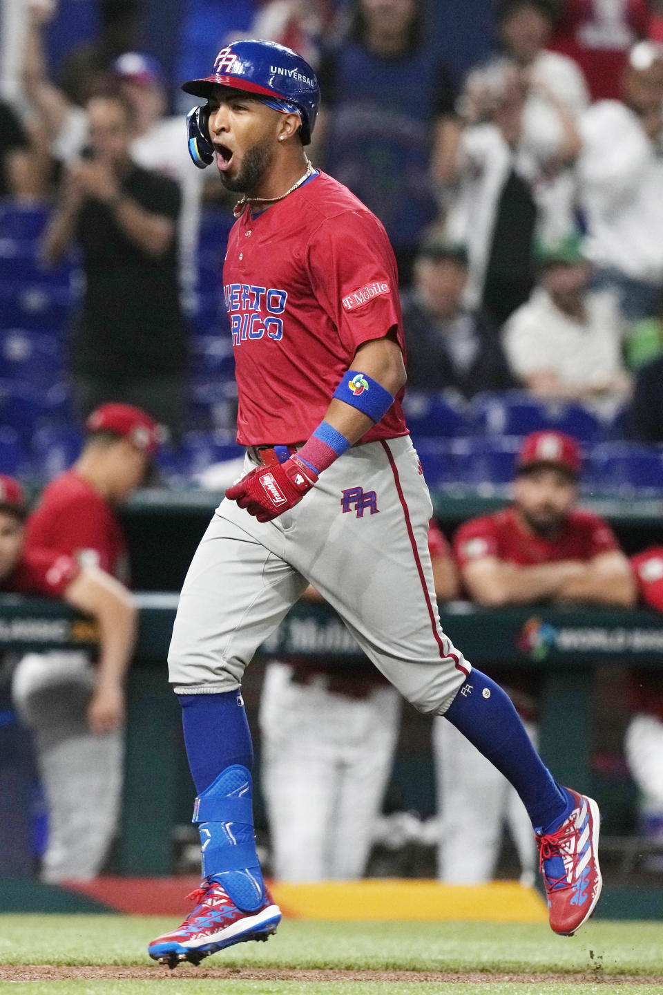 Puerto Rico's Eddie Rosario (17) yells after hitting a home run during the first inning of a World Baseball Classic game against Mexico, Friday, March 17, 2023, in Miami. (AP Photo/Marta Lavandier)