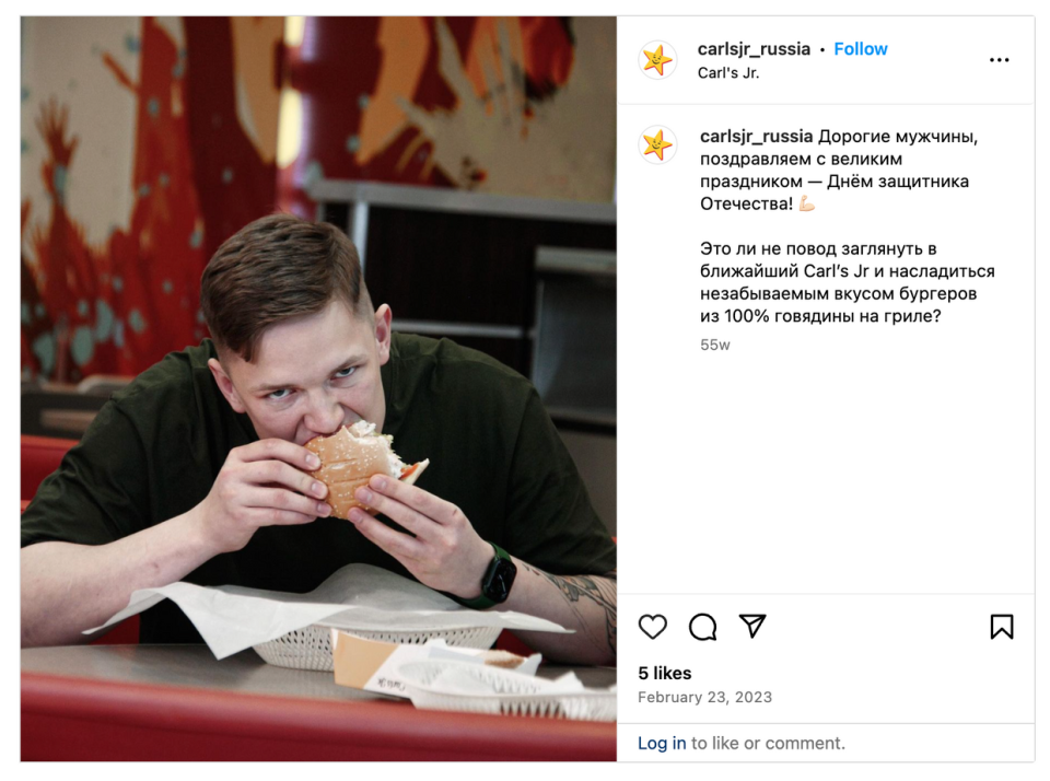 Instagram post on Carl Jr.'s Russian page. The caption reads: “Dear men, congratulations on the great holiday — the Defender of the Fatherland Day! Isn’t this a reason to pop into your nearest Carl’s Jr and enjoy the unforgettable taste of 100% grilled beef burgers?” (Instagram/CarlJr Russia)