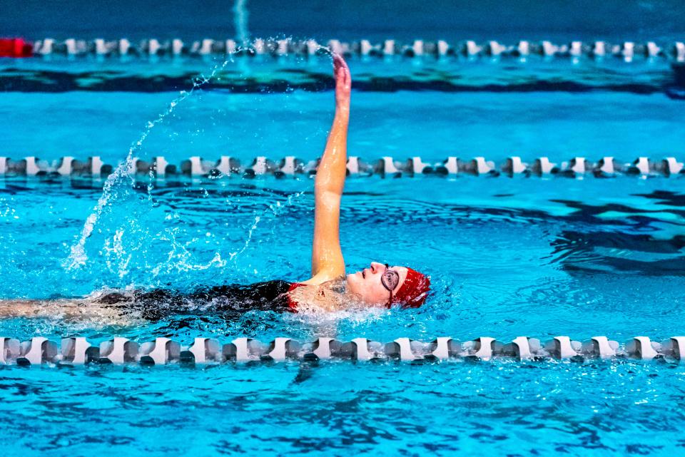 New Bedford's Cynthia Torres competes in the 100 backstroke.