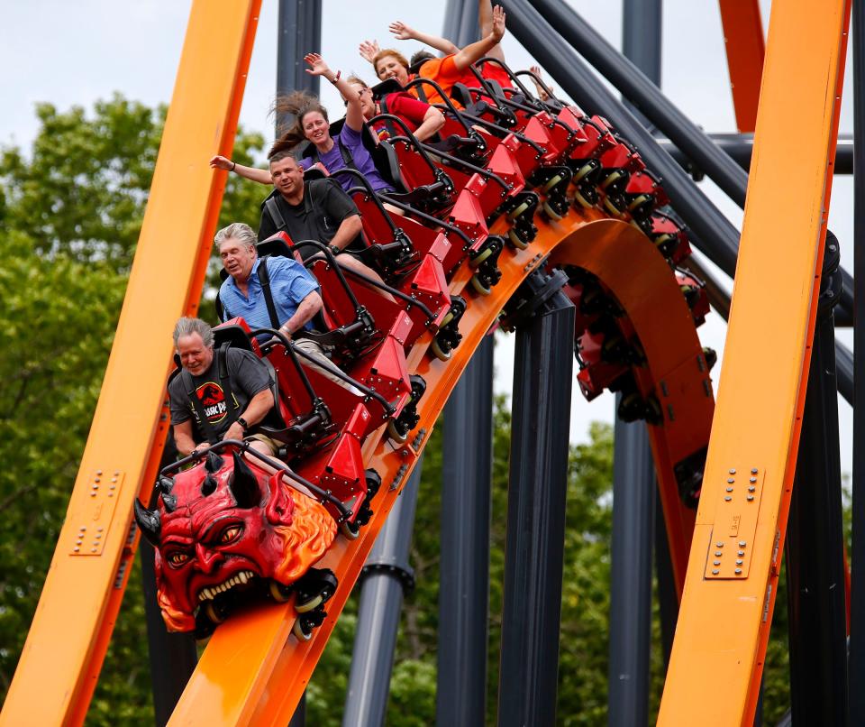 People ride the Jersey Devil roller coaster at Six Flags Great Adventure in Jackson Township, NJ, Thursday morning, June 10, 2021.   The new attraction is 3,000 feet of soaring, single-rail, I-beam track.