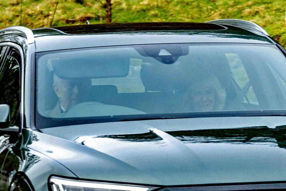 <p>Paul Campbell/PA Images via Getty</p> King Charles III and Queen Camilla arrive at Crathie Kirk, near Balmoral, for a Sunday church service