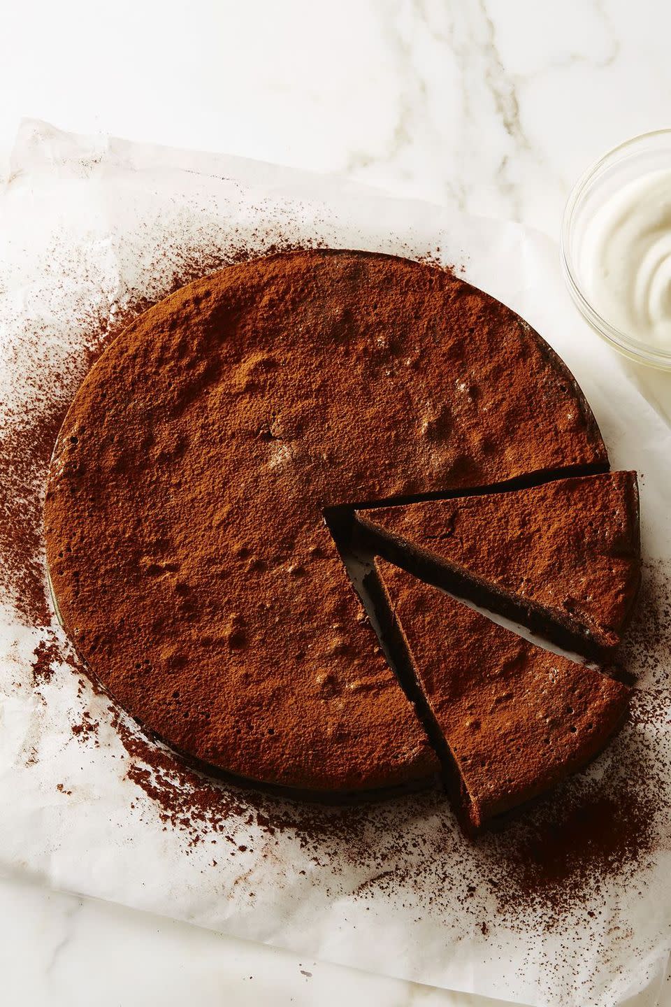 a round flourless chocolate cake