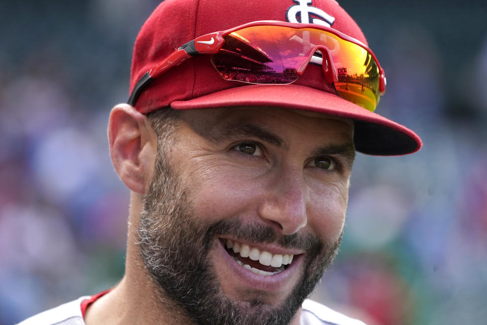 St. Louis Cardinals first baseman Paul Goldschmidt smiles as he give a radio interview after a baseball game against the Chicago Cubs Thursday, Aug. 25, 2022, in Chicago. The Cardinals won 8-3. (AP Photo/Charles Rex Arbogast)