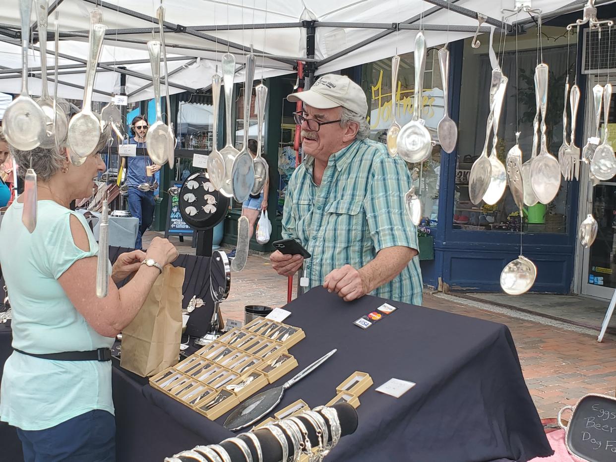 Artist Steve Manning turns everyday cutlery into works of art. Owner of The Silver Spoon, he was one of the many vendors Saturday at Market Square Day.