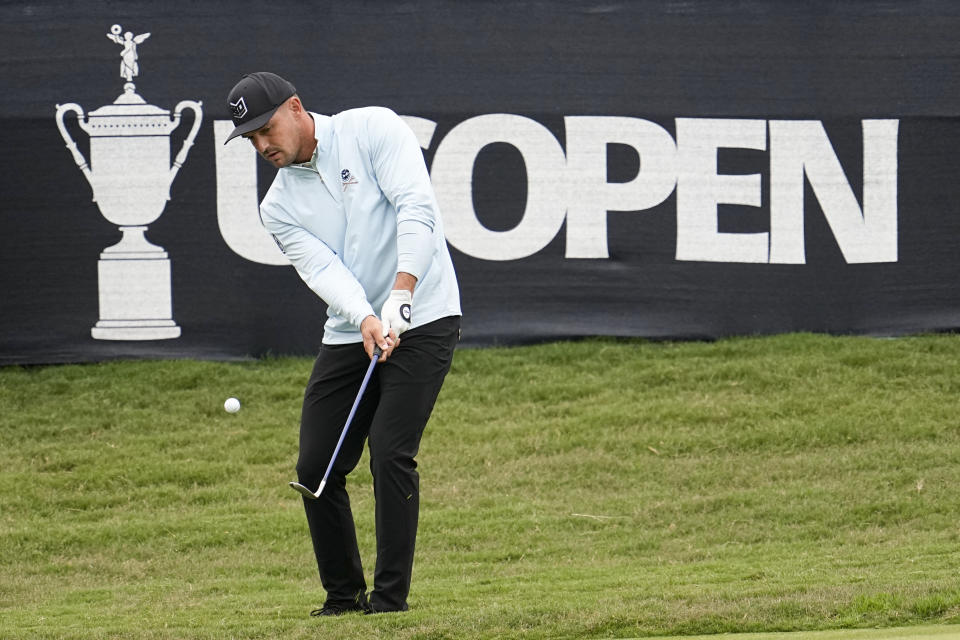 Bryson DeChambeau chips to the green on the second hole during the first round of the U.S. Open golf tournament at Los Angeles Country Club on Thursday, June 15, 2023, in Los Angeles. (AP Photo/George Walker IV)