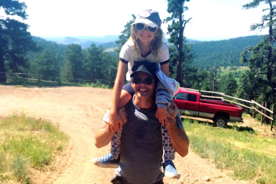 <p>James Marsden/Instagram</p> James Marsden carries daughter Mary on a hike.