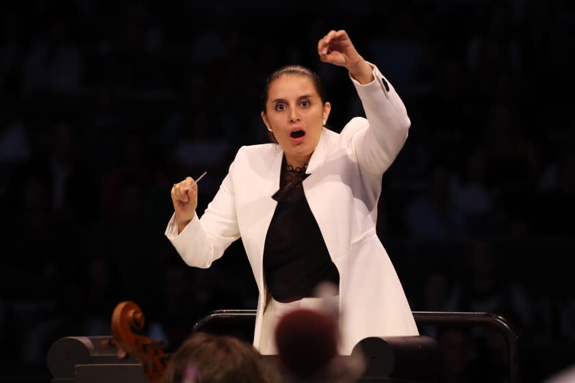Los Angeles, CA - August 11: Conductor Lina Gonzalez-Granados leads the orchestra at the Hollywood Bowl on Thursday, Aug. 11, 2022 in Los Angeles, CA. (Dania Maxwell / Los Angeles Times)